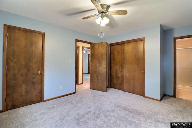 2204 Bramblewood Ln, Fremont, NE 68025 - unfurnished bedroom featuring carpet floors, a closet, and ceiling fan