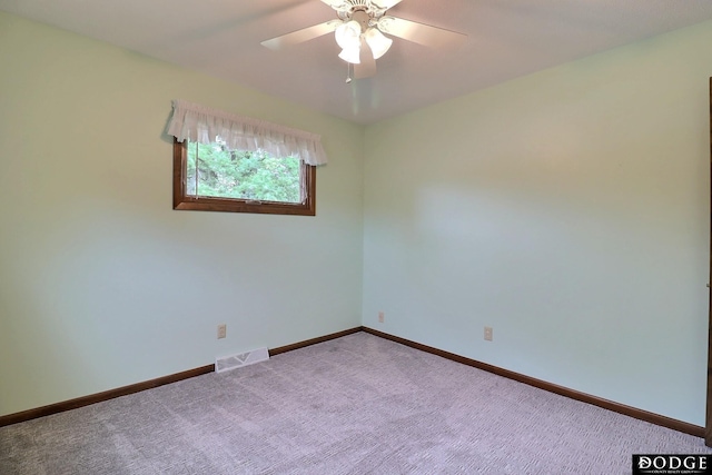 2204 Bramblewood Ln, Fremont, NE 68025 - carpeted empty room featuring a ceiling fan and baseboards