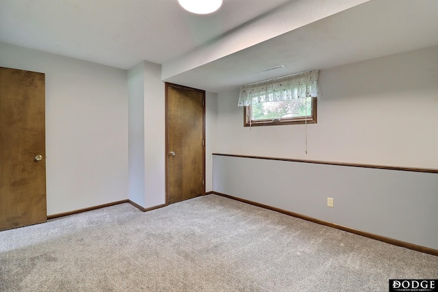 2204 Bramblewood Ln, Fremont, NE 68025 - below grade area featuring carpet flooring and baseboards