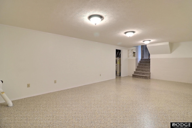 2204 Bramblewood Ln, Fremont, NE 68025 - finished basement featuring a textured ceiling and stairs
