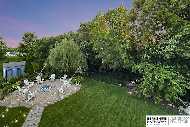 10818 S 109th St, Papillion, NE 68046 - yard at dusk with a patio