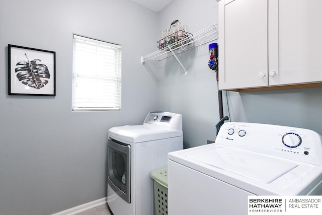 10818 S 109th St, Papillion, NE 68046 - laundry room featuring separate washer and dryer and cabinet space