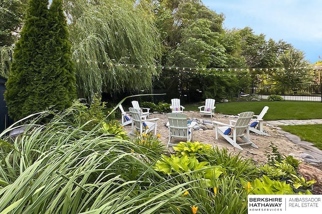 10818 S 109th St, Papillion, NE 68046 - view of yard featuring an outdoor fire pit and a patio area