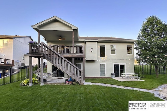 10818 S 109th St, Papillion, NE 68046 - back of property featuring stairway, a patio area, a fenced backyard, and a wooden deck