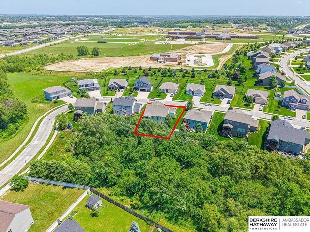 10818 S 109th St, Papillion, NE 68046 - aerial view of residential area with property parcel outlined