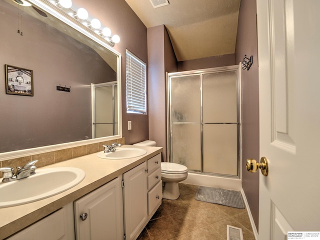 6015 S 163rd Cir, Omaha, NE 68135 - full bathroom with tile patterned floors, a shower stall, and double vanity