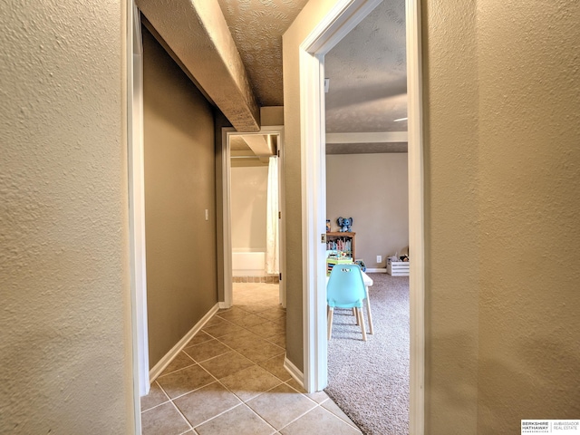 6015 S 163rd Cir, Omaha, NE 68135 - hallway with tile patterned flooring and a textured wall