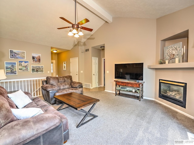 6015 S 163rd Cir, Omaha, NE 68135 - living room featuring a ceiling fan, carpet floors, beam ceiling, a glass covered fireplace, and high vaulted ceiling