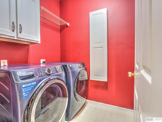 6015 S 163rd Cir, Omaha, NE 68135 - washroom with washer and dryer, cabinet space, tile patterned flooring, and a textured wall