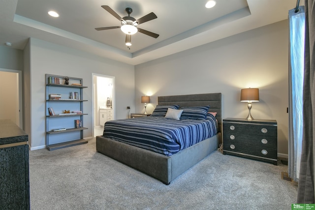 5017 N 209th St, Elkhorn, NE 68022 - carpeted bedroom featuring a tray ceiling, recessed lighting, ensuite bathroom, and ceiling fan