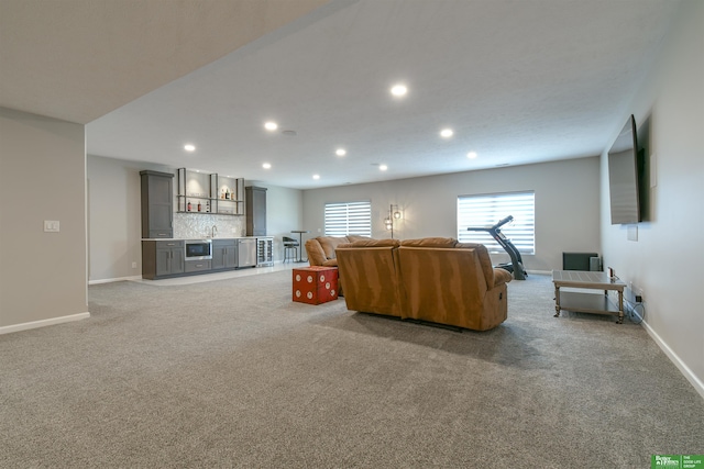 5017 N 209th St, Elkhorn, NE 68022 - living area with wet bar, light carpet, and recessed lighting