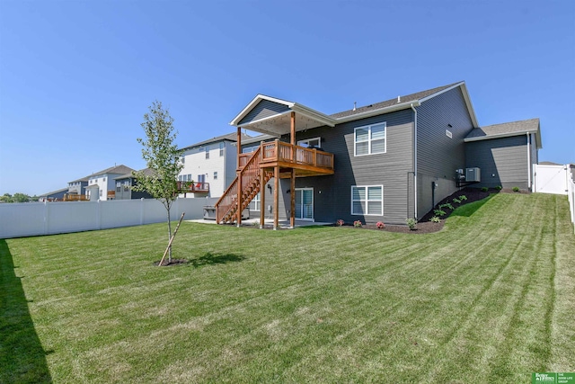 5017 N 209th St, Elkhorn, NE 68022 - back of property featuring a wooden deck, stairs, and a gate