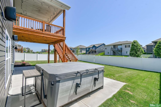 5017 N 209th St, Elkhorn, NE 68022 - fenced backyard with a hot tub, stairway, a patio, a residential view, and a deck