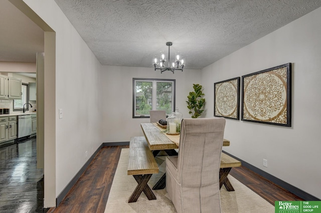 11680 Meredith Ave, Omaha, NE 68164 - dining room with a chandelier, dark wood-style floors, and a textured ceiling