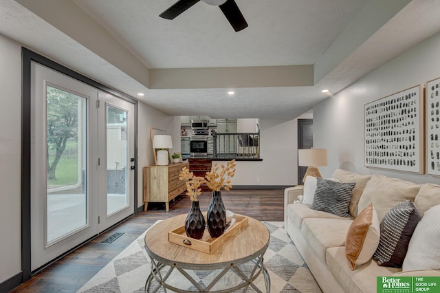 11680 Meredith Ave, Omaha, NE 68164 - living area featuring dark wood-type flooring, recessed lighting, and a ceiling fan