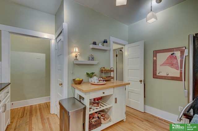 526 S 51st Ave, Omaha, NE 68132 - bathroom with hardwood / wood-style floors and baseboards