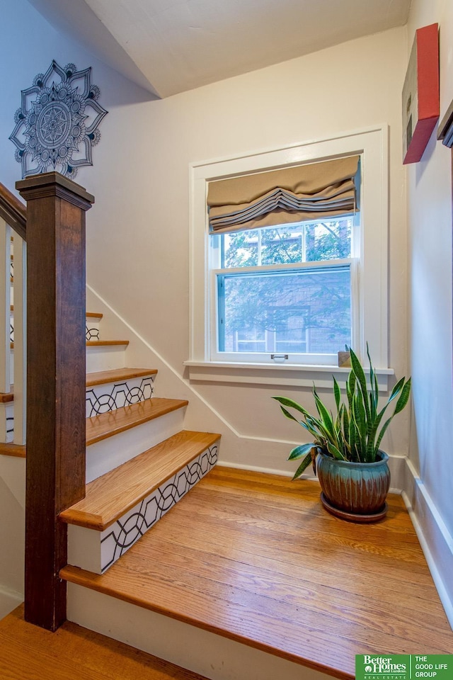 526 S 51st Ave, Omaha, NE 68132 - stairway with wood finished floors and baseboards