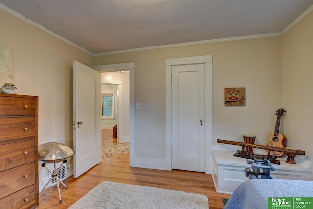 526 S 51st Ave, Omaha, NE 68132 - bedroom featuring light wood-type flooring and ornamental molding