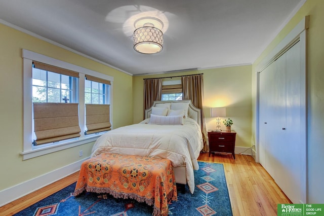 526 S 51st Ave, Omaha, NE 68132 - bedroom with ornamental molding, wood finished floors, and a closet