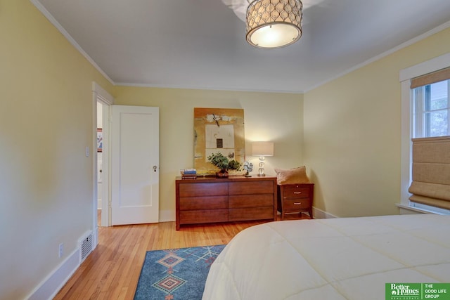 526 S 51st Ave, Omaha, NE 68132 - bedroom featuring ornamental molding and light wood-style flooring