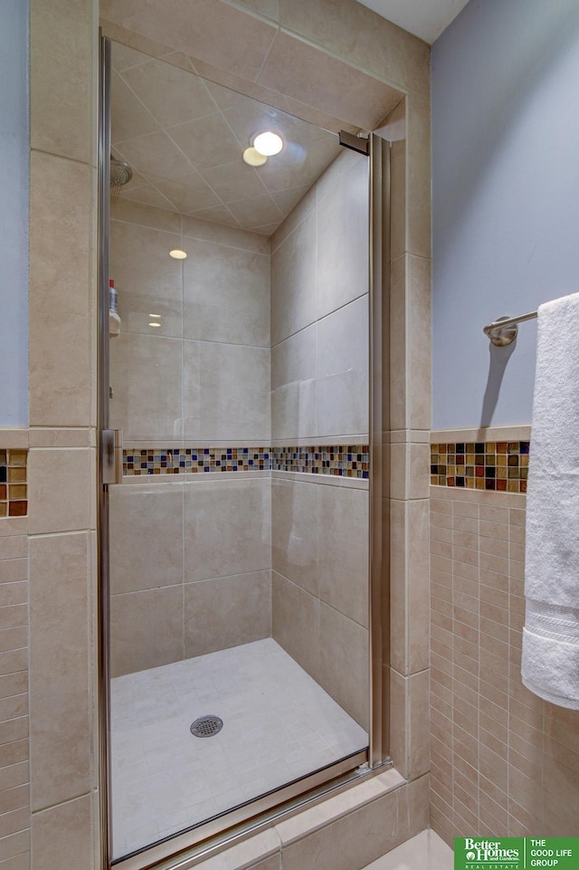 526 S 51st Ave, Omaha, NE 68132 - bathroom with a stall shower and recessed lighting