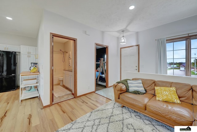1015 Ridge Rd, Hickman, NE 68372 - living room featuring light wood finished floors and recessed lighting