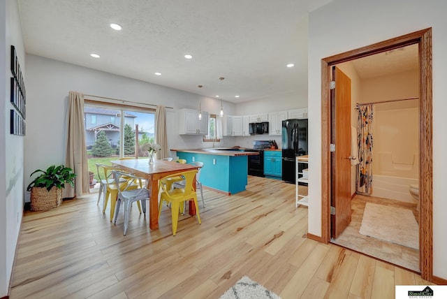 1015 Ridge Rd, Hickman, NE 68372 - dining room featuring recessed lighting and light wood-style floors