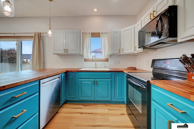 1015 Ridge Rd, Hickman, NE 68372 - kitchen with black appliances, wooden counters, blue cabinets, light wood-style flooring, and recessed lighting