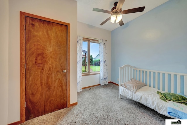 1015 Ridge Rd, Hickman, NE 68372 - carpeted bedroom with baseboards and a ceiling fan