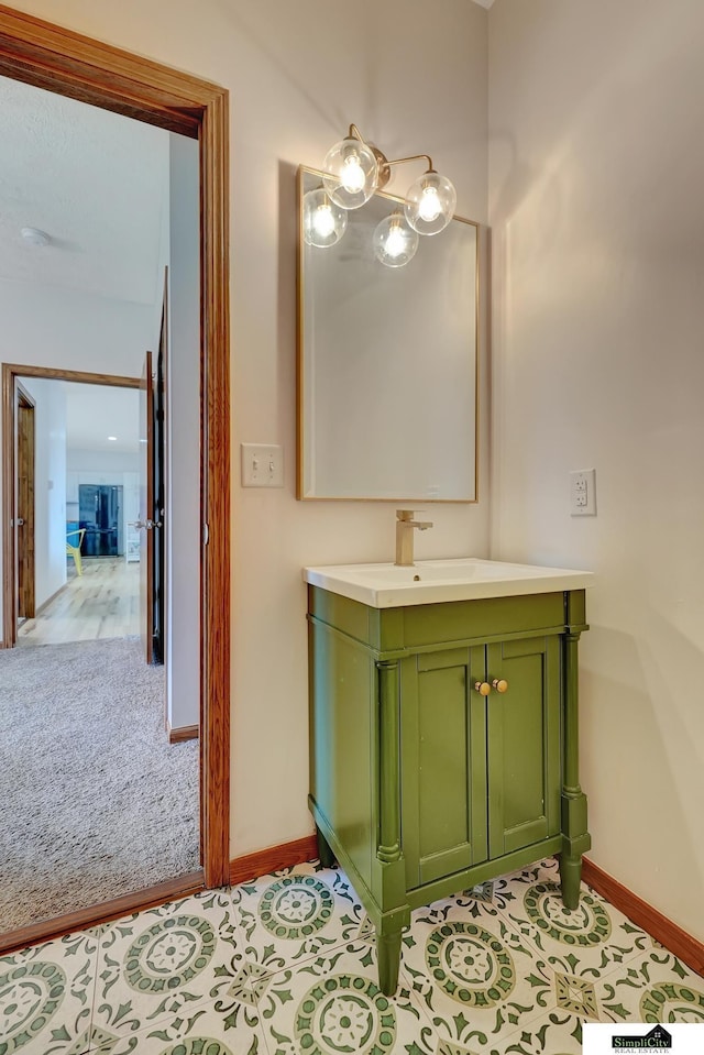 1015 Ridge Rd, Hickman, NE 68372 - bathroom featuring baseboards and vanity