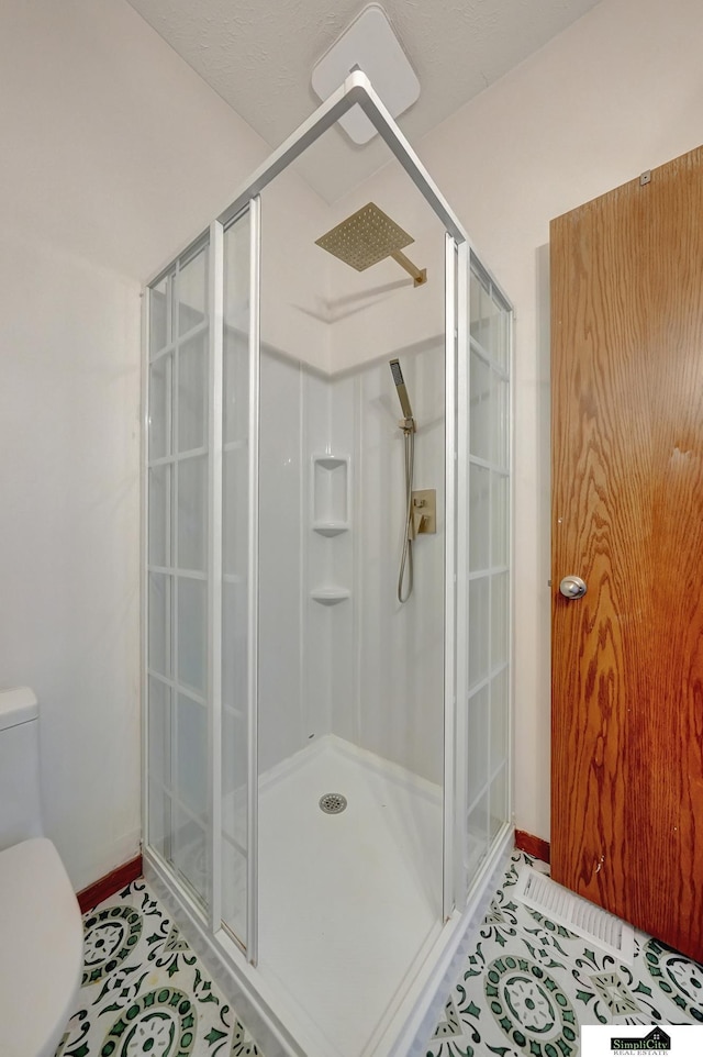 1015 Ridge Rd, Hickman, NE 68372 - full bathroom featuring a stall shower and tile patterned flooring