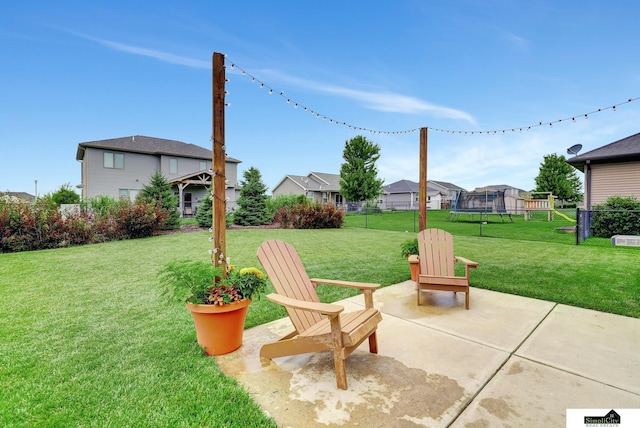 1015 Ridge Rd, Hickman, NE 68372 - view of patio / terrace featuring a trampoline and a residential view