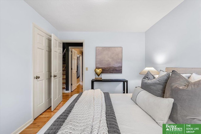 12079 Westover Rd, Omaha, NE 68154 - bedroom with wood finished floors and baseboards