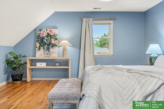 12079 Westover Rd, Omaha, NE 68154 - bedroom with wood finished floors and lofted ceiling