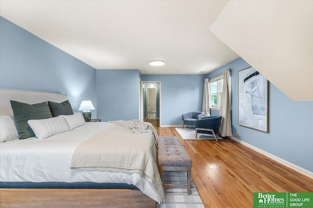 12079 Westover Rd, Omaha, NE 68154 - bedroom featuring wood finished floors and ensuite bath