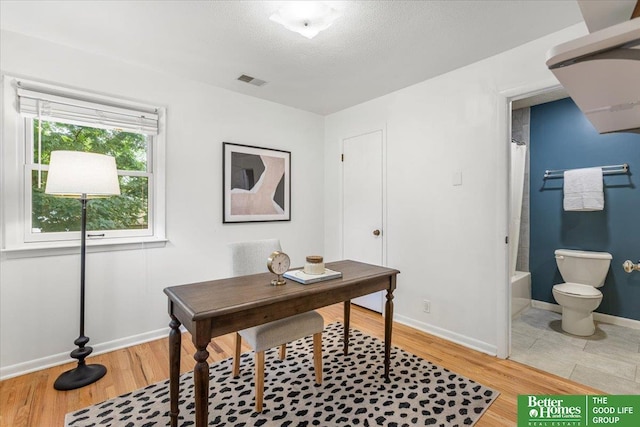 12079 Westover Rd, Omaha, NE 68154 - home office with light wood finished floors and baseboards
