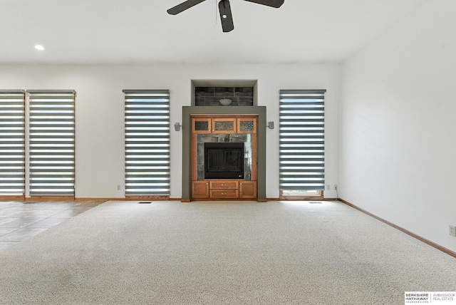 10505 S 179th St, Omaha, NE 68136 - unfurnished living room with ceiling fan and carpet