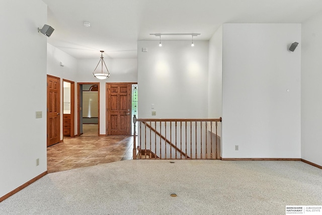 10505 S 179th St, Omaha, NE 68136 - entryway with carpet flooring and rail lighting