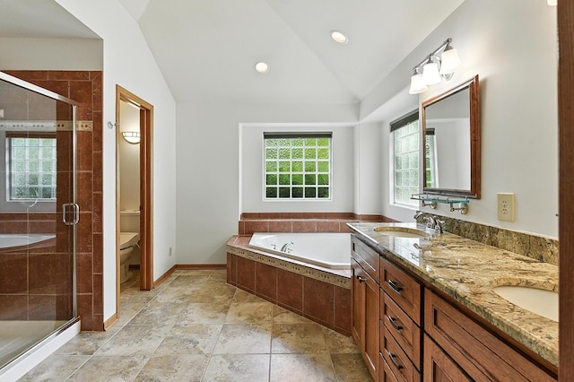 10505 S 179th St, Omaha, NE 68136 - full bathroom featuring lofted ceiling, double vanity, a garden tub, a stall shower, and recessed lighting