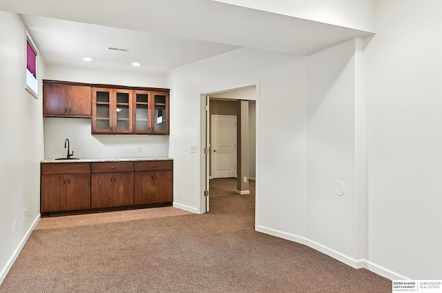 10505 S 179th St, Omaha, NE 68136 - indoor wet bar with light colored carpet and recessed lighting
