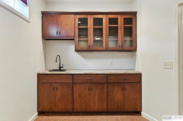 10505 S 179th St, Omaha, NE 68136 - bar with a sink and baseboards