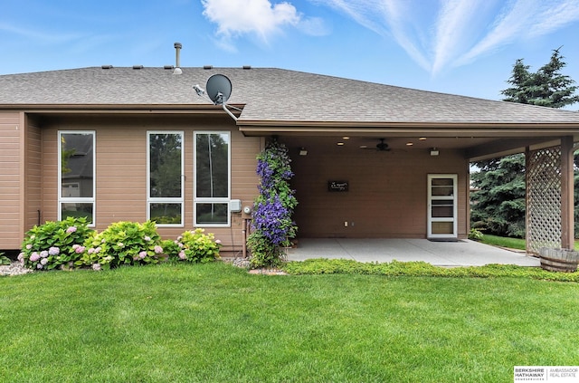10505 S 179th St, Omaha, NE 68136 - back of house with a patio, a lawn, a ceiling fan, and roof with shingles