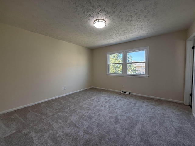 13910 Shirley St, Omaha, NE 68144 - carpeted empty room featuring a textured ceiling and baseboards