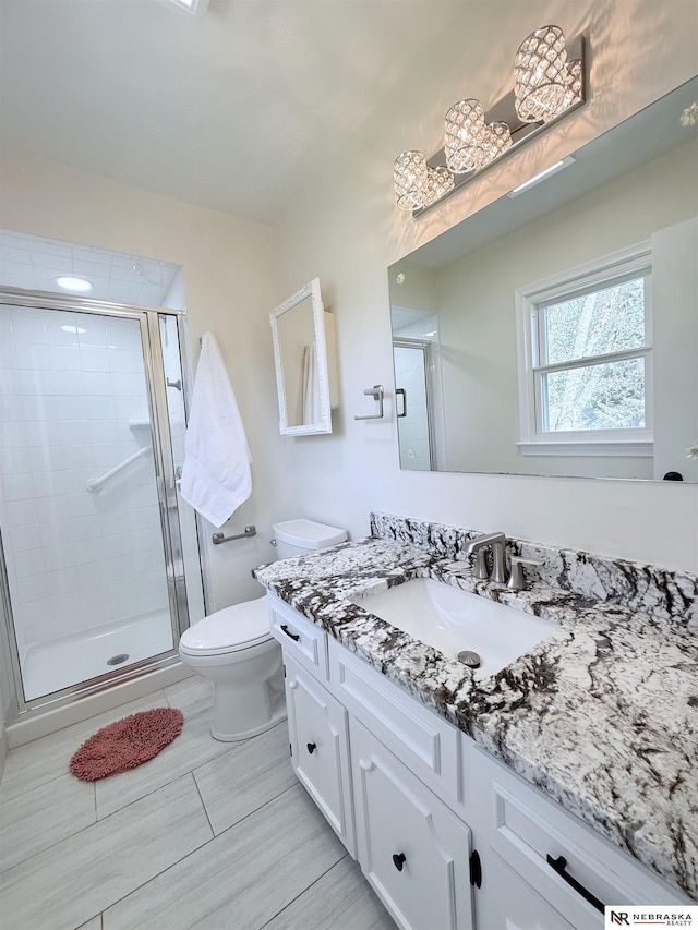13910 Shirley St, Omaha, NE 68144 - full bathroom featuring vanity and a stall shower
