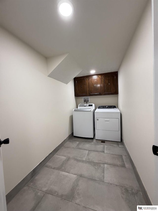 13910 Shirley St, Omaha, NE 68144 - washroom featuring cabinet space and washer and dryer