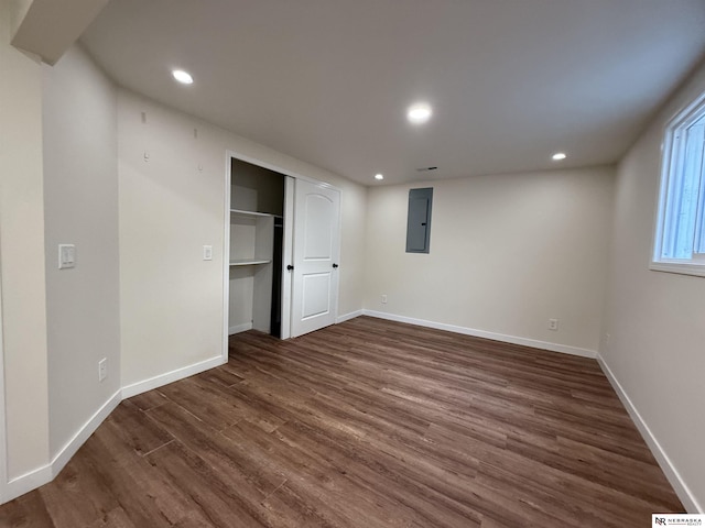 13910 Shirley St, Omaha, NE 68144 - below grade area featuring dark wood-style floors, electric panel, and recessed lighting