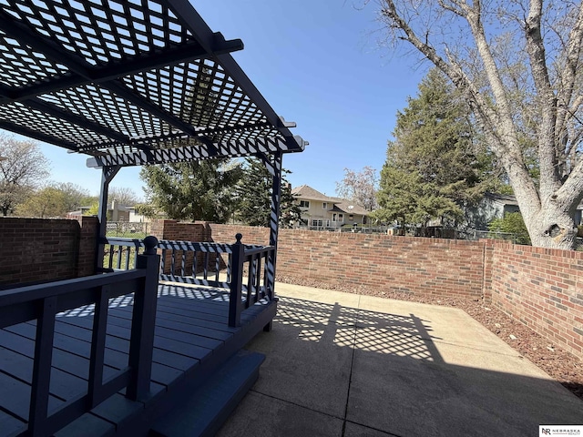 13910 Shirley St, Omaha, NE 68144 - fenced backyard with a pergola and a patio