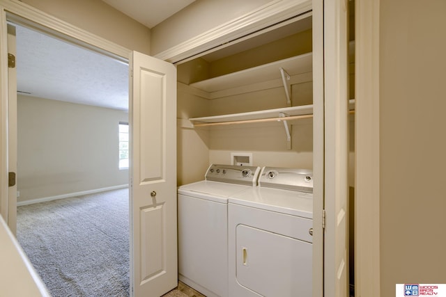 1215 Turtle Creek Rd, Lincoln, NE 68521 - laundry area with washer and dryer and light carpet