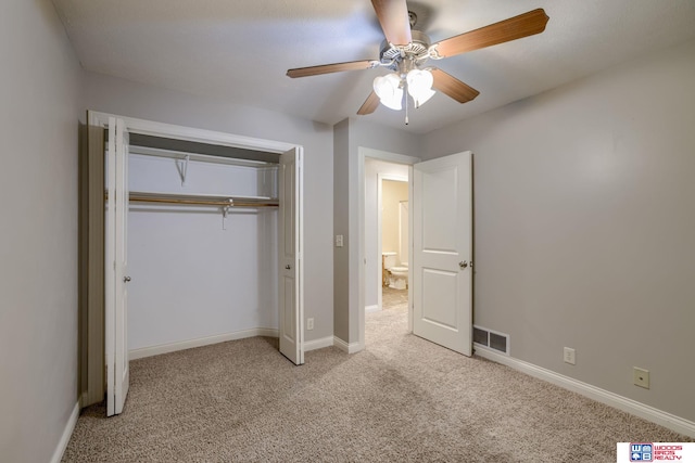 1215 Turtle Creek Rd, Lincoln, NE 68521 - unfurnished bedroom with light carpet, a closet, and ceiling fan