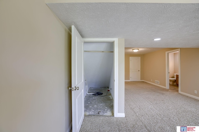 1215 Turtle Creek Rd, Lincoln, NE 68521 - corridor featuring carpet floors, a textured ceiling, and recessed lighting
